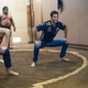 Illustration for article titled Tiny Shrimp Men F1 Drivers Wilt Against Sumo Wrestlers